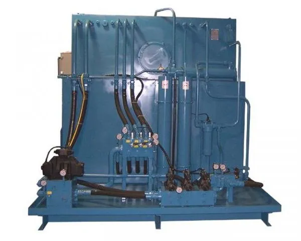 A blue hydraulic power unit with an accumulator tower and several gauges, shown against a plain background