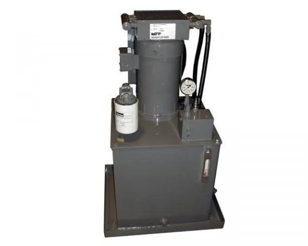 Gray hydraulic power unit with an MFP nameplate, filter and pressure gauge, shown against a white background