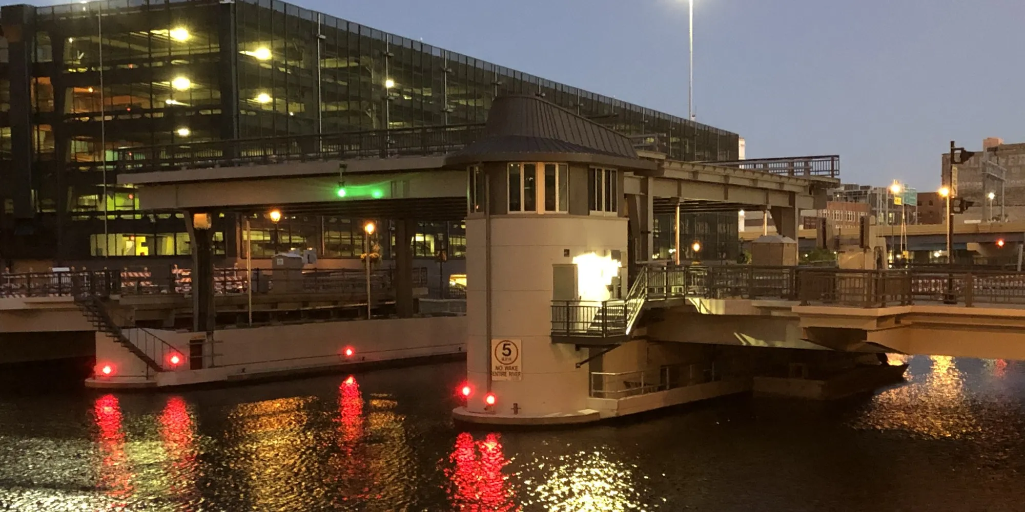 The Michigan Street lift bridge in Milwaukee, lit at dusk